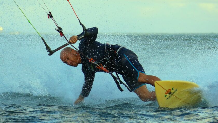 photo of man kite surfing