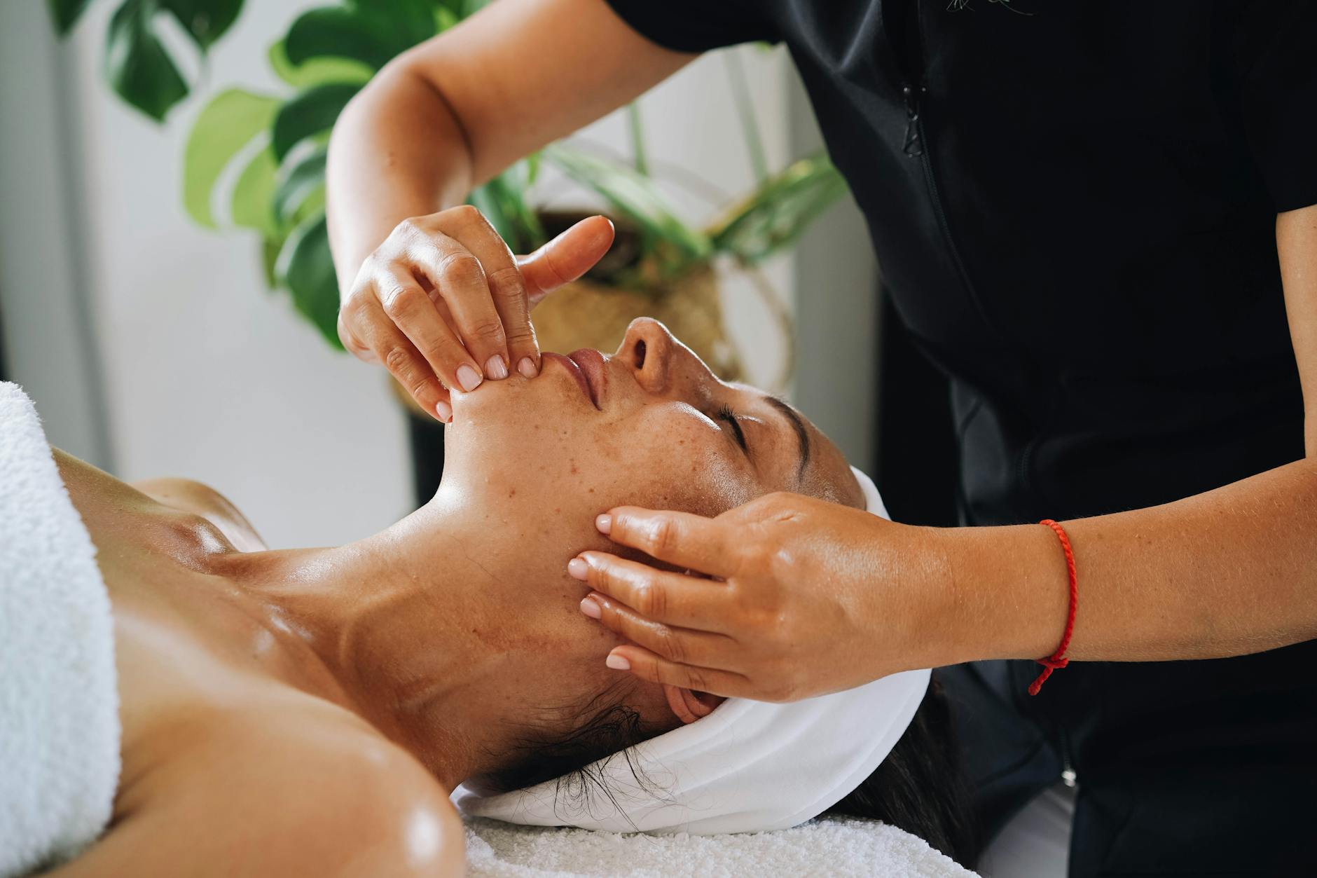 close up shot of a woman having a face massage