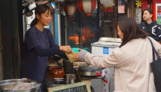 a woman selling street food