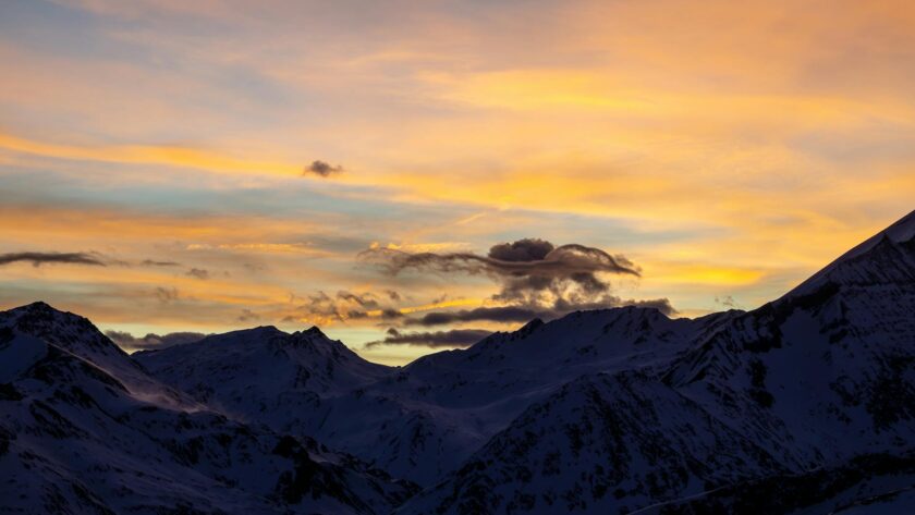 silhouette of mountain range at dusk